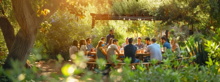 a vibrant outdoor team-building scene in woodside, ca, showcasing a diverse group of professionals engaging enthusiastically in collaborative activities amidst lush greenery and dappled sunlight.